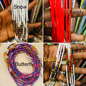 May include: Four different types of beaded waist beads, each with a unique colour and pattern. The beads are held in a hand, and the names of each type are written on the image: "Snow", "Feisty", "Butterfly", and "Dual".