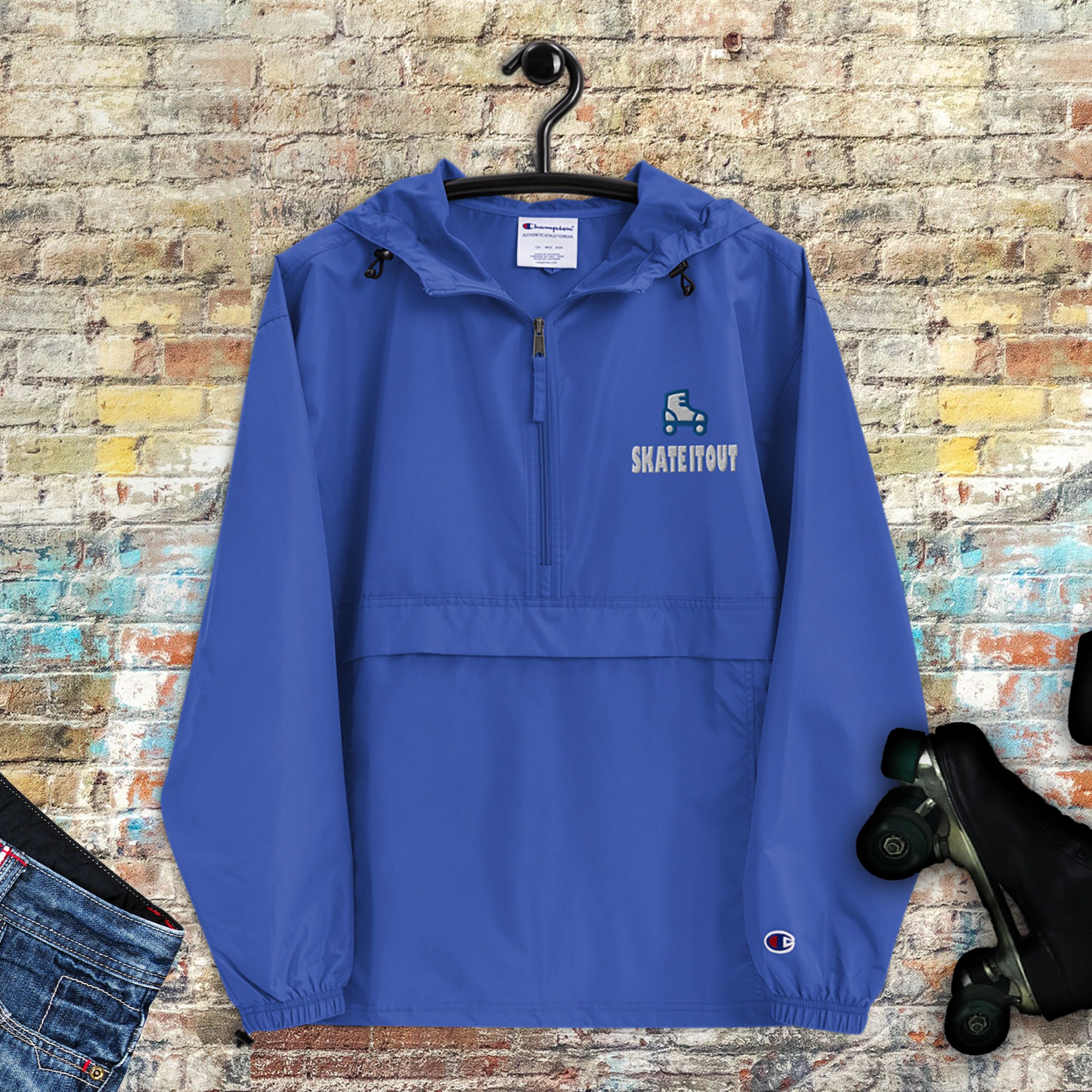 Embroidered Skate It Out Champion Packable Jacket in Royal
