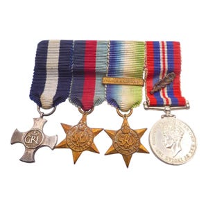 Distinguished service dsc geo vi atlantic star mid miniature medal group of 4