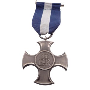 May include: A silver-toned cross-shaped medal with a blue and white striped ribbon. The central disc features a crown above the letters "ER". The medal is suspended from a metal bar and ring.
