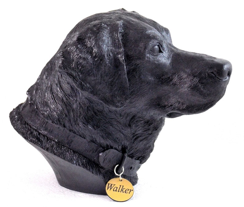 May include: Black Labrador Retriever dog head sculpture with a collar and a gold tag that reads "Walker".