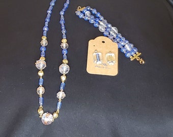 Blauw/lichtblauwe set ketting, armband en oorbellen