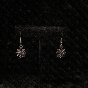 silver spiderweb dangly earrings