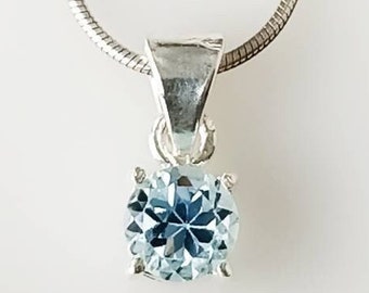 Blue Topaz Sterling Silver Pendant: Minimalist Round Cut, December Birthstone