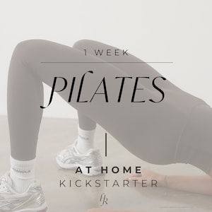 May include: A woman in black leggings demonstrates a Pilates exercise. The text "1 WEEK PILATES AT HOME KICKSTARTER" is displayed on a white background.