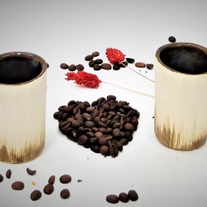 Elegant Handmade Ceramic Tumbler with Grass-Like Stripes and Natural Clay Glaze