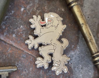 Sabretooth "Fatalis Dens Cultri." - Heraldic Enamel Pin