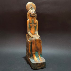 Unique statue  sitting of the gods Sekhmet distinctive and rare 17 inches by 4 inches by 7 inches {Made in Egypt}}