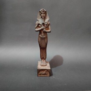The unique statue of King Akhenaten, a heavy solid stone made in Egypt