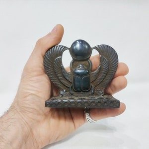 Winged scarab. Winged Egyptian scarab. Ancient Egyptian art. Brilliantly made in Egypt