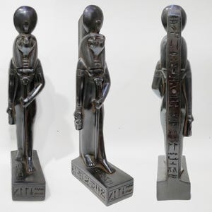 Ra Statue. Statue of The  god Ra   in black brilliantly. The Egyptian Sun—Ra, King of the Gods. made in Egypt. kemet Statue. 18 inches