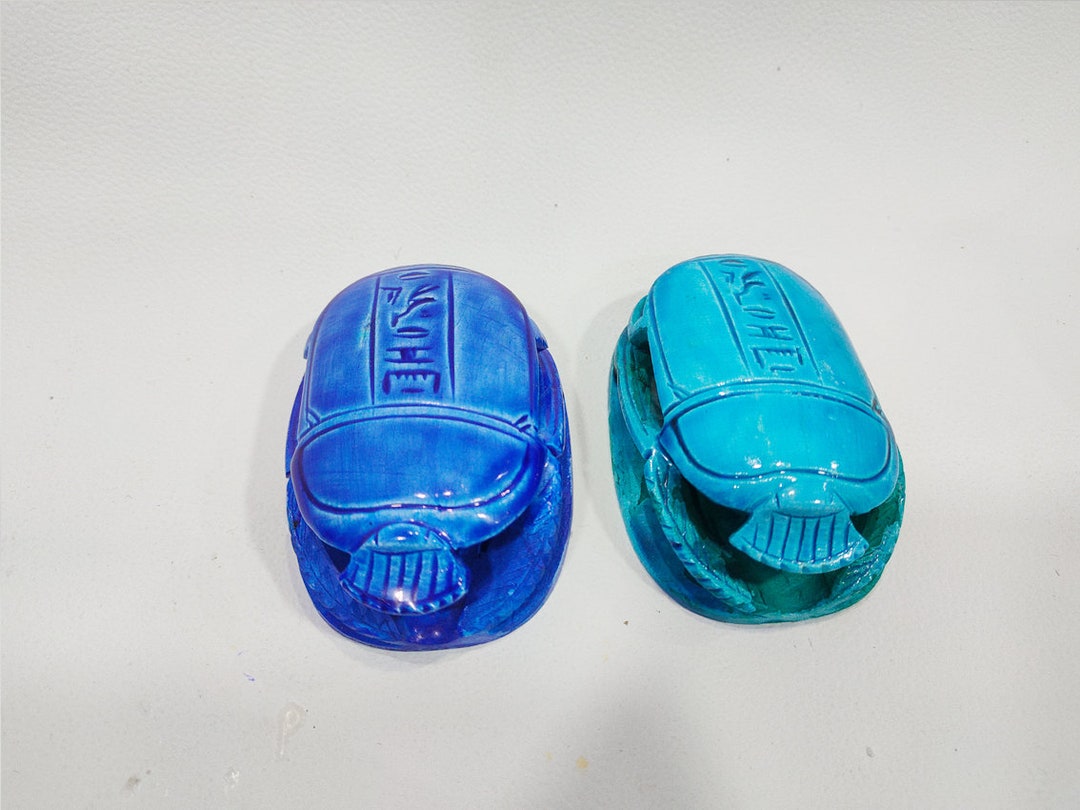 Egyptian Scarabs Beetles. Hieroglyphic Writings Cover the Base . Made
