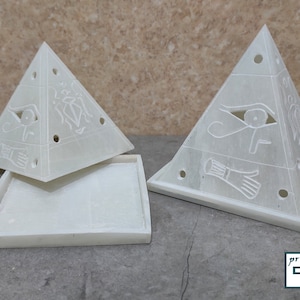 Alabaster pyramid. Giza Pyramids . The luminous Egyptian pyramid. Pyramid candle holder. Alabaster. Made in Egypt