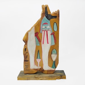 Una rara tablilla de madera del dios Anubis. Fragmento de madera perteneciente a Anubis. Réplica realizada con gran maestría en Egipto. Rara. Antigua.
