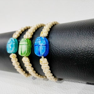 Scarab bracelet. Egyptian scarab and wool bracelet, adjustable size. Scarab bracelet for luck and wealth. Available in three colors