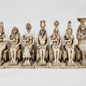 A group. Egyptian statues of ancient gods and kings. Horus. Thoth. Tutankhamun . Ramses. Amon. Akhenaten. Brilliantly made in Egypt