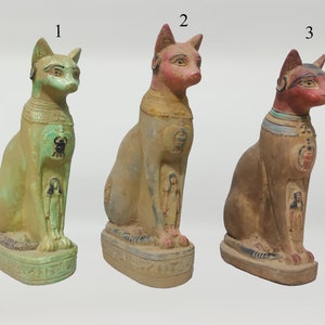 The statue of the goddess Bastet, the protection of the goddess Isis.the protection of the Egyptian scarab, a wonderful statue,made in egypt