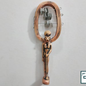 sistrum of the goddess Sekhmet (musical instrument)Great sound. sistrum. The goddess Sekhmet. Brilliantly made in Egypt