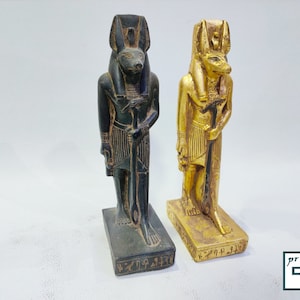 Statue of Anubis,  A distinctive statue available in two colors, black and antique gold, handcrafted in Egypt.