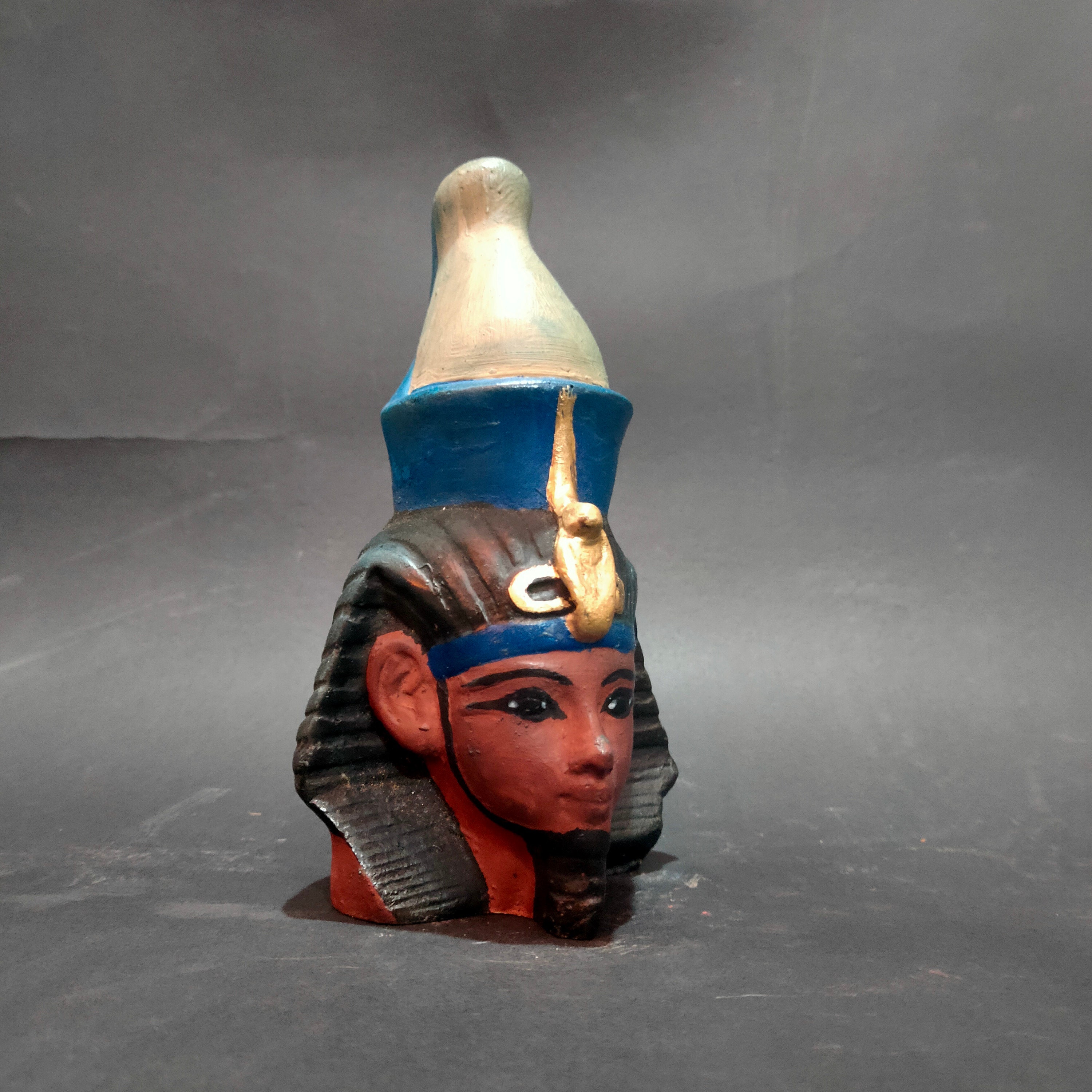 The head of the ancient pharaonic king statue is a unique and rare model made in Egypt