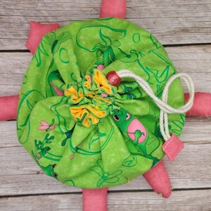 May include: A rustic wooden sign with the text "Welcome to our home" in white lettering. The sign features a distressed finish and a simple, inviting design, perfect for entryway decor.