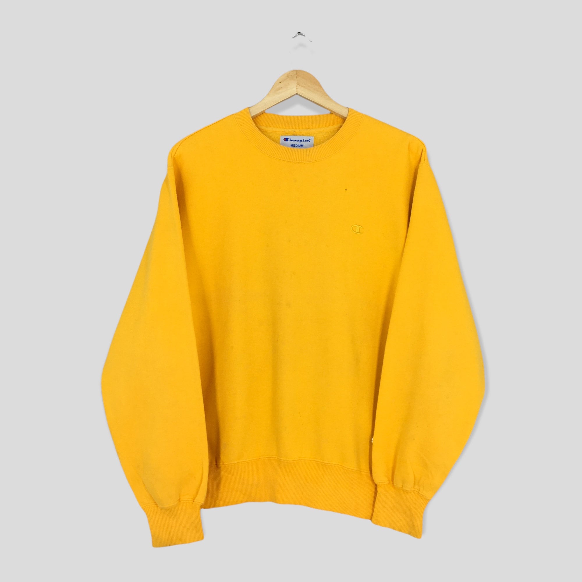 Sudadera Champion script Logo amarillo hombre