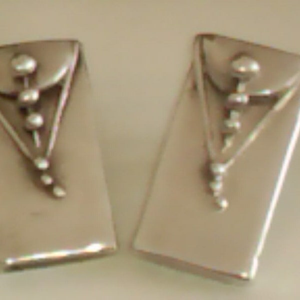 Ear clips, unique pieces, silver-plated, very apart.