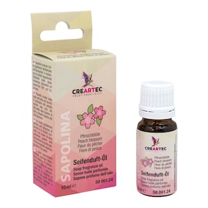 Könnte beinhalten: Eine braune Glasflasche und eine Schachtel Seifenduftöl. Die Schachtel und die Flasche tragen die Aufschrift "CREARTEC" und "SAPOLINA". Die Schachtel hat eine Pfirsichblüten-Grafik und den Text "Peach blossom" in mehreren Sprachen. Die Flasche enthält 10 ml Öl.