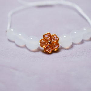 Close up of the flower charm.