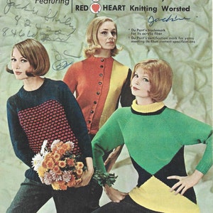 May include: Three women model different styles of knitted sweaters in a vintage fashion magazine ad. The ad features the text "New Fashion Knits" and "Red Heart Orlon*Sayelle† Red Heart Knitting Worsted".