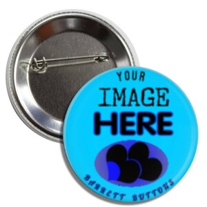 May include: A blue button with the text "YOUR IMAGE HERE" in black. The button has a blue and purple heart design at the bottom with the text "BARRETT BUTTONS" in white.