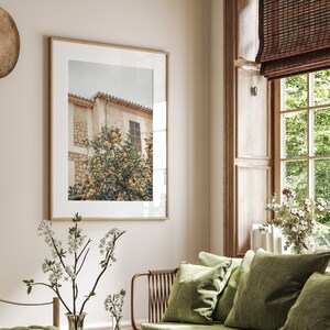 Southern Italy print featuring Sicily landscape displayed in a bright living room. Printable Mediterranean scenic art, adding sunlit countryside charm to modern interiors.