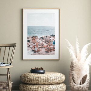 Vintage-style Amalfi Coast art above a bed in a serene bedroom. Earth tone pastel imagery adds cozy Mediterranean ambiance and travel-inspired tranquility. Digital download, ready to print and frame.