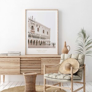 Venice architecture print displayed above a bed in a calm bedroom. The elegant cityscape creates a cozy and refined atmosphere reminiscent of European travel. Digital download, print-ready.