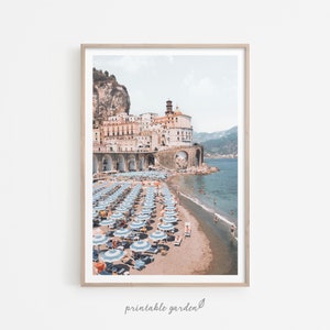 Amalfi Coast print (Positano) displayed in a bright living room. Printable Mediterranean travel poster with pastel tones, perfect for bringing coastal charm to a modern interior.