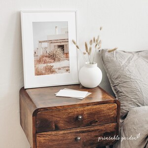 Printable wall art trio with Mediterranean countryside views: whitewashed house with canopy, dirt path through an olive grove, and plant detail. Neutral, rustic artwork perfect for cozy, travel-inspired interiors.