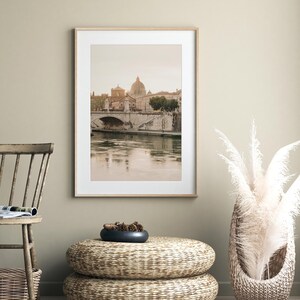 Neutral Rome cityscape print capturing historic Italian streets in muted color palette. A printable wall art digital download adding sophisticated travel ambiance to living spaces, offices, or cozy corners.