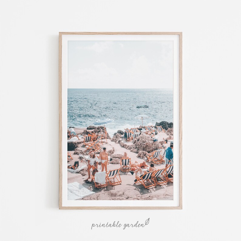 Digital wall art print of Amalfi Coast with pastel buildings on cliffs above the sea. Romantic Italian coastal scene in soothing earth tones—perfect for adding Mediterranean warmth and beauty to any room. Instant digital download, ready to print.