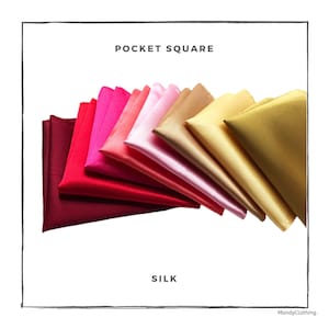 May include: A set of ten silk pocket squares in various shades of red, pink, and gold. The pocket squares are arranged in a fan shape, with the darkest shade at the bottom and the lightest shade at the top. The text "POCKET SQUARE" and "SILK" are visible in the image.