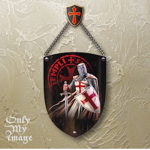 Templar on wooden shield with old real nails.