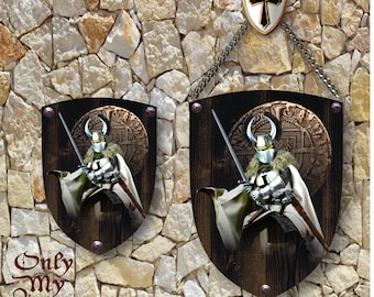 Medieval Teutonic Knight оn wooden shield with old real nails.
