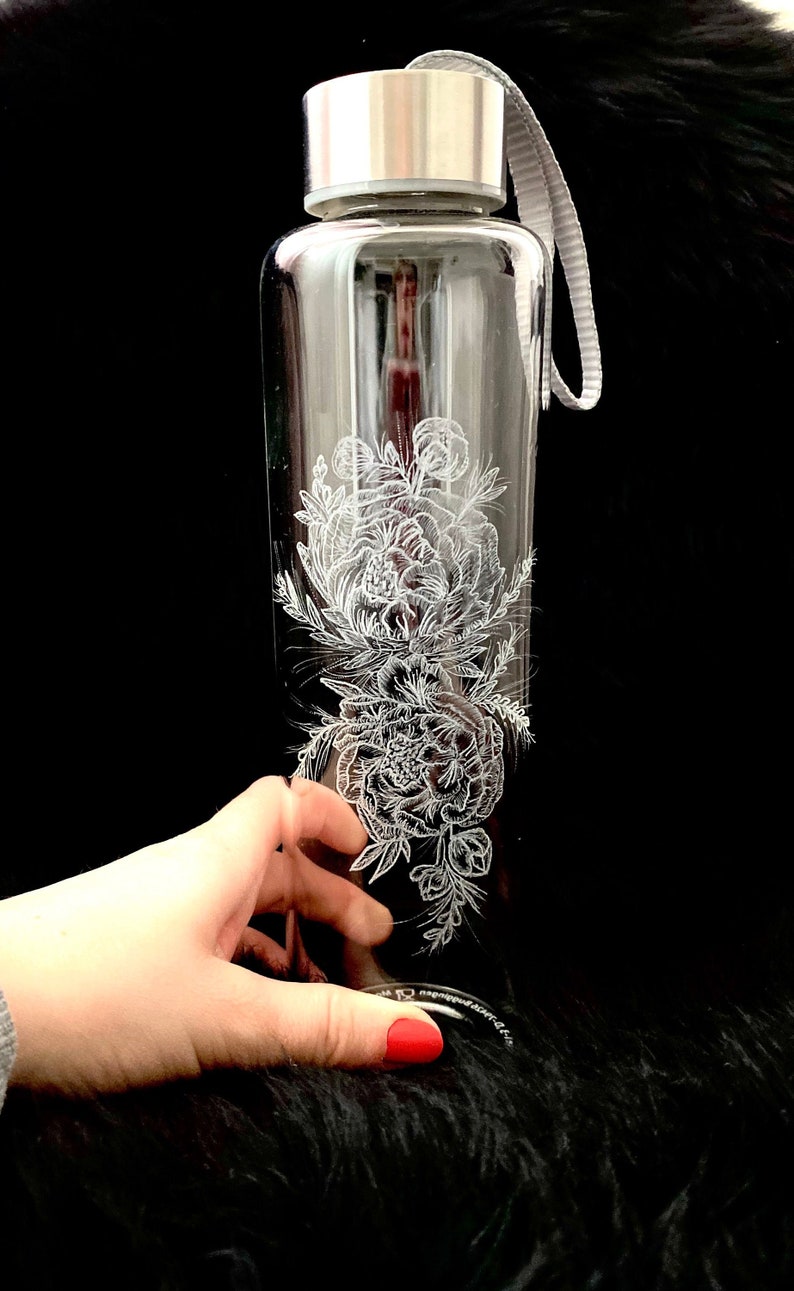 Hand-engraved borosilicate glass bottle