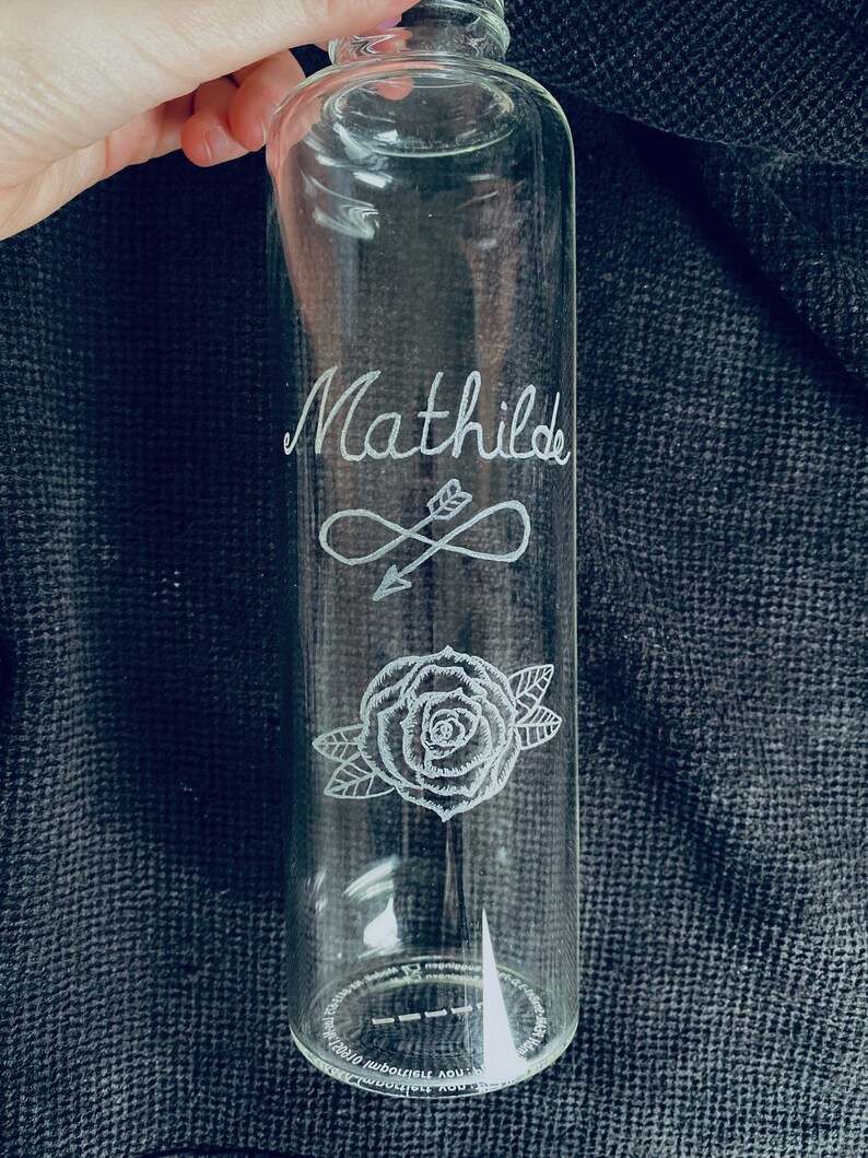 Hand-engraved borosilicate glass bottle