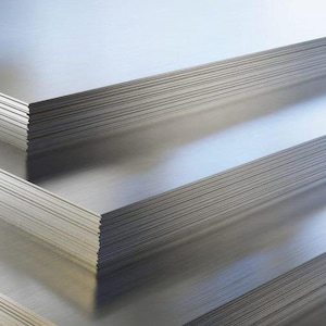 May include: A stack of silver metal sheets, likely used for construction or manufacturing.