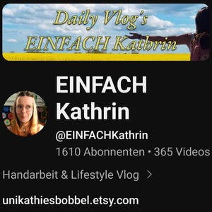 May include: A YouTube channel banner featuring a woman in a field of yellow flowers. The text on the banner reads "Daily Vlog's EINFACH Kathrin". The channel name is "EINFACH Kathrin" and the description is "Handarbeit & Lifestyle Vlog". The website address is "unikathiesbobbel.etsy.com".