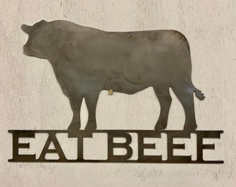 Comer arte de pared de metal de carne de res