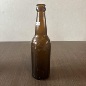 Vintage West End Brewing Co Embossed Amber Beer Bottle Utica NY 12.5 oz