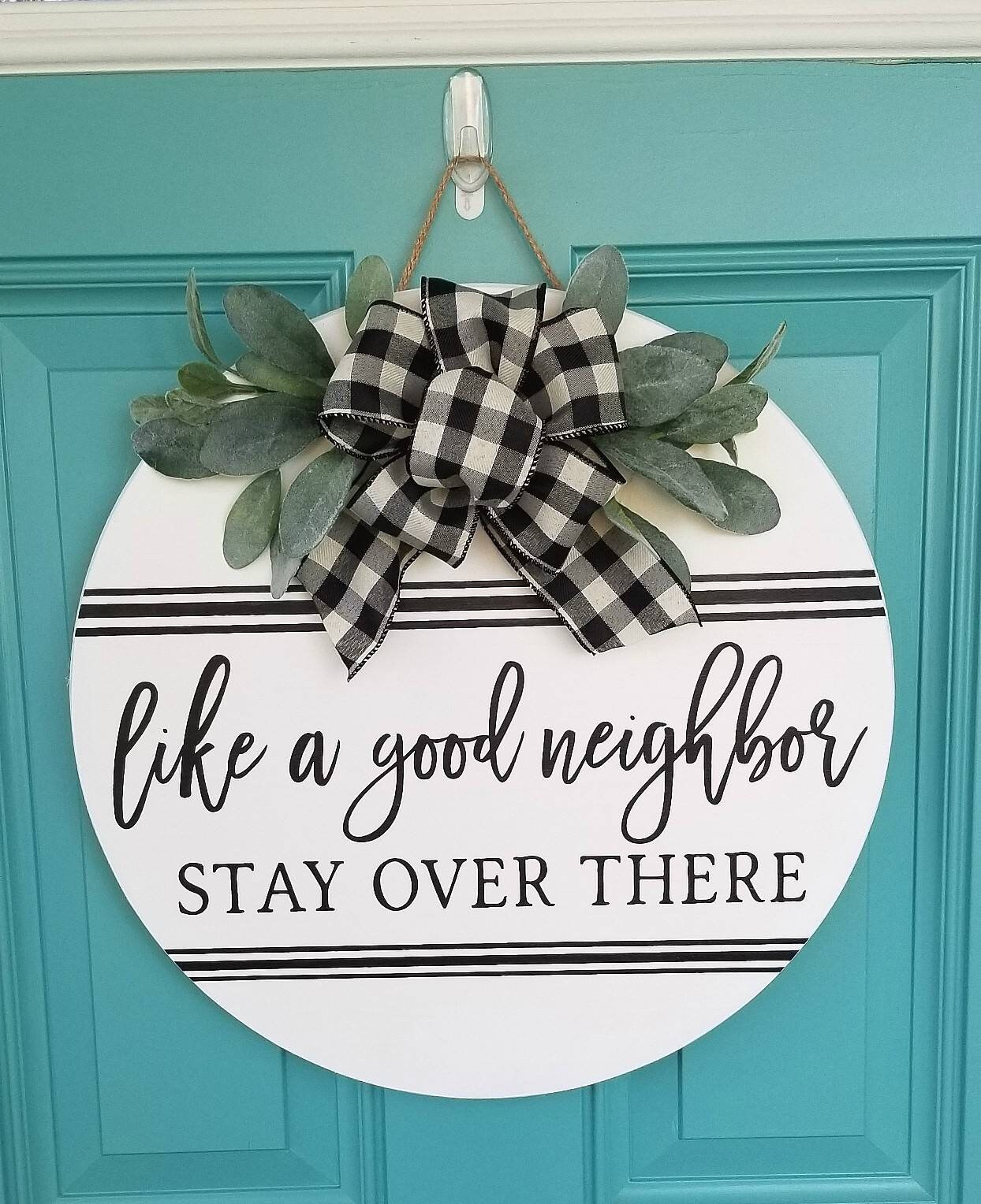 Wreaths & Door Hangers Like a Good Neighbor Stay Over There door hanger