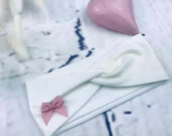 Diadema de jersey de algodón orgánico, diadema turbante para niñas, perfecta para bautizo, en color blanco crema con lazo, un regalo muy considerado.