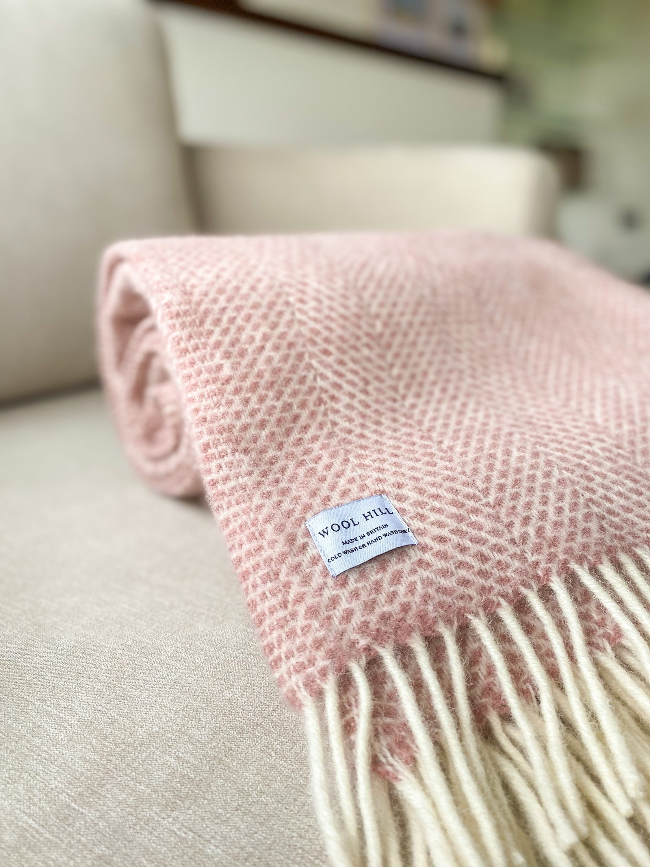 Dusky pink wool throw deals